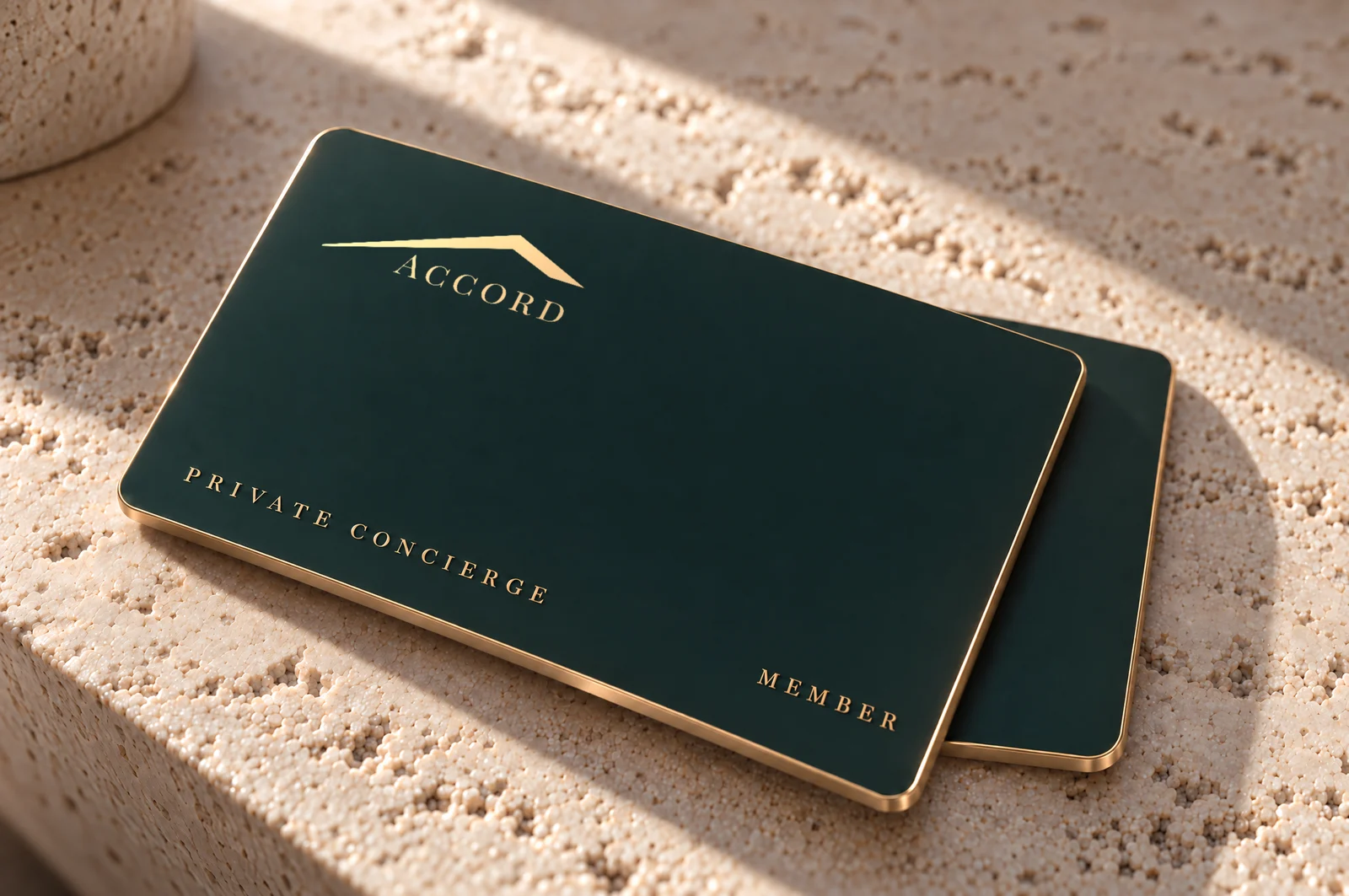 The Accord Private Concierge Card: a matte green metal card with a gold-coloured edge, the Accord logo and the words “Private Concierge”